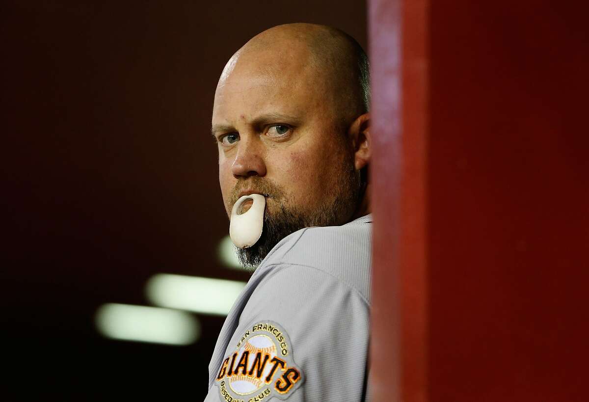 PHOENIX, AZ - APRIL 08: Casey McGehee #14 of the San Francisco Giants watches from the dugout during the MLB game against the Arizona Diamondbacks at Chase Field on April 8, 2015 in Phoenix, Arizona. (Photo by Christian Petersen/Getty Images)