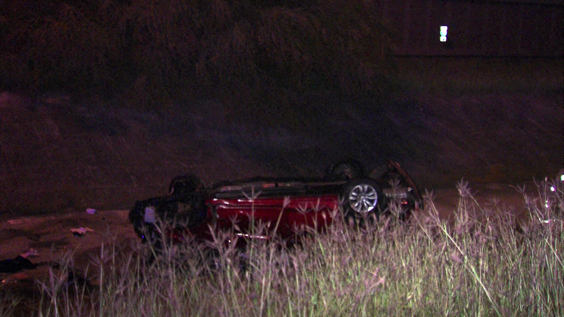 Police searching for driver involved in Northwest Side rollover crash