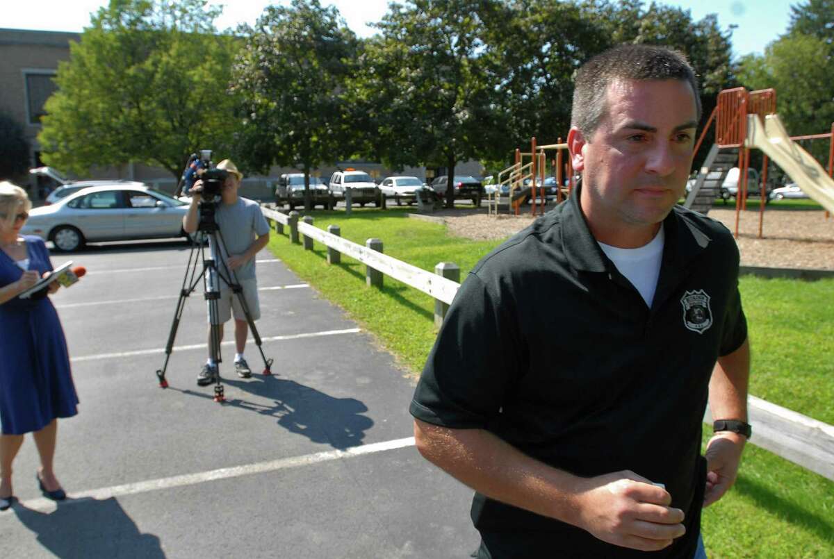 Bethlehem Police Department Patrolman Chris Hughes talks to the media about his months-long conflict with the department Wednesday Sept. 2, 2009, in Delmar, NY. Philip Kamrass / Times Union archive)