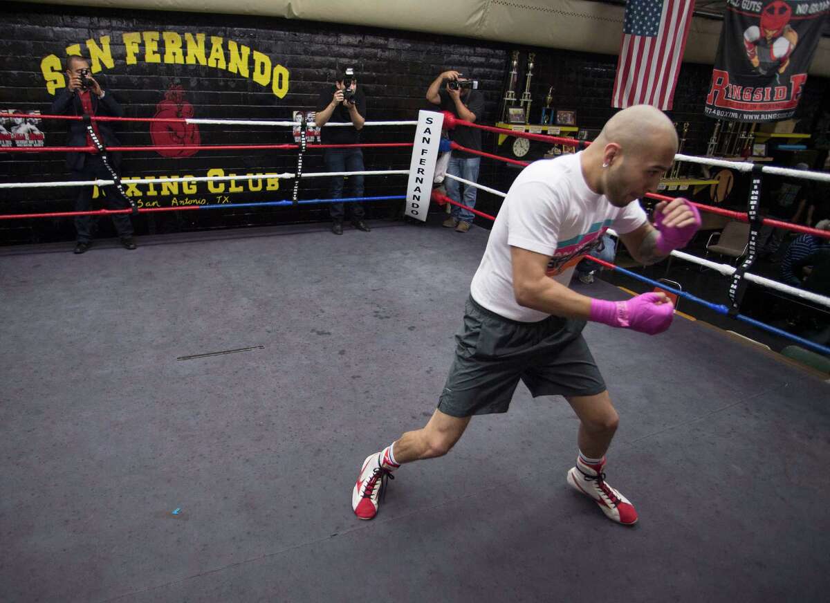 Boxer James Leija Jr. practices in the ring during a media event, Wednesday, April 8, 2015, at San Fernando Boxing Club in San Antonio.