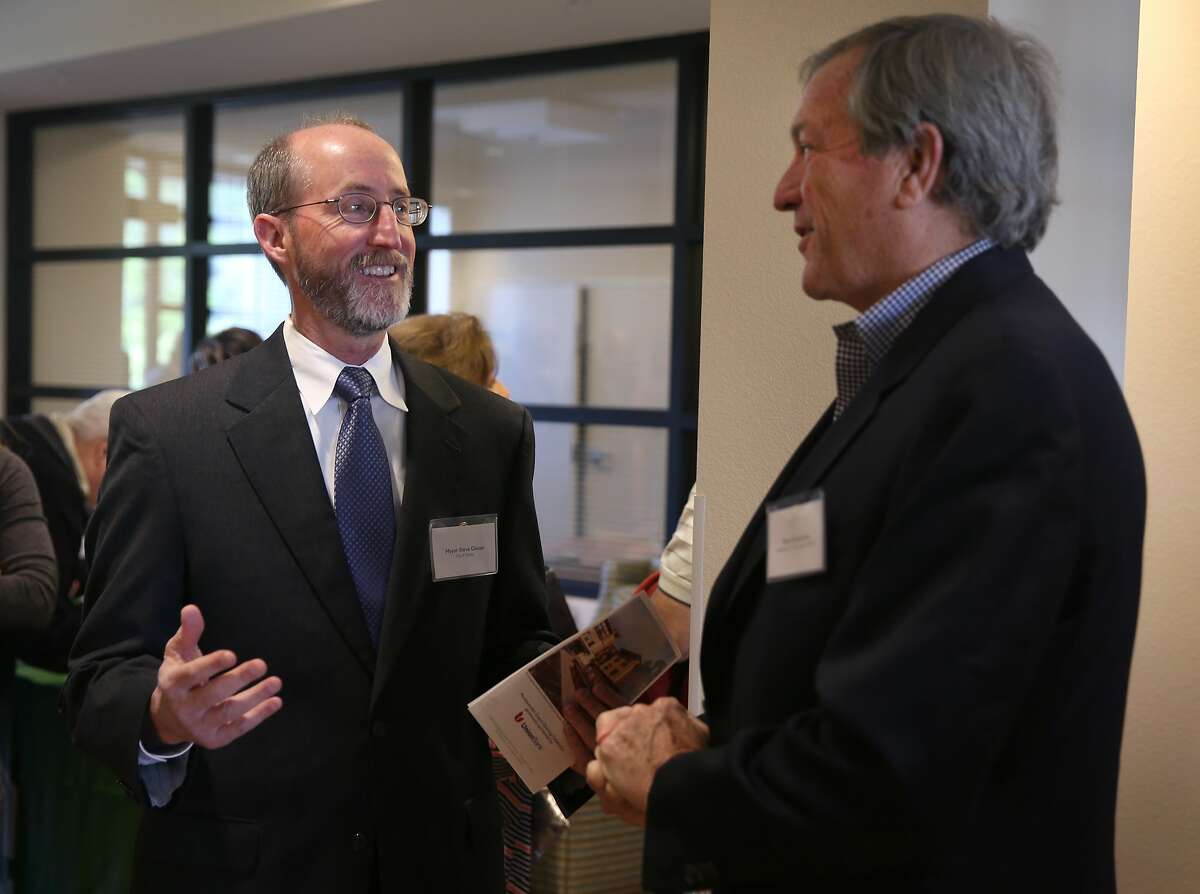 Orinda mayor Steve Glazer (left) chats with Rep. Mark DeSaulnier at a grand opening ceremony for an affordable senior apartment complex in Orinda, Calif. on Thursday, April 9, 2015. Glazer is facing a runoff election in May against Assemblywoman Susan Bonilla, who is endorsed by DeSaulnier, for the 7th District Senate seat which opened up when DeSaulnier was elected to the U.S. Congress.