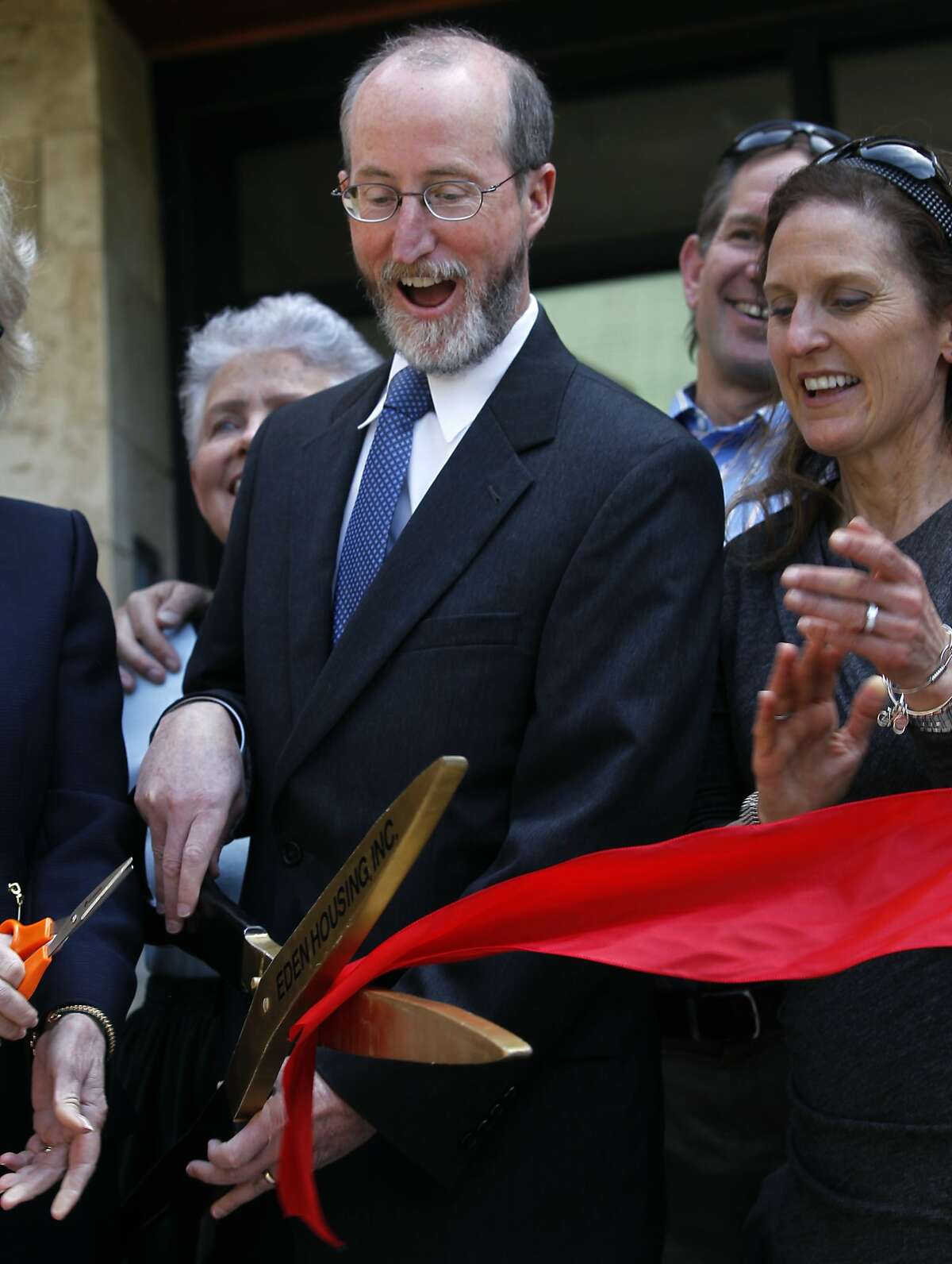 Orinda mayor Steve Glazer has the honor of wielding the big scissors at a ribbon cutting ceremony for an affordable housing complex for seniors in Orinda, Calif. on Thursday, April 9, 2015. Glazer is facing a runoff election in May against Assemblywoman Susan Bonilla for the 7th District Senate seat which opened up when Mark DeSaulnier was elected to the U.S. Congress.