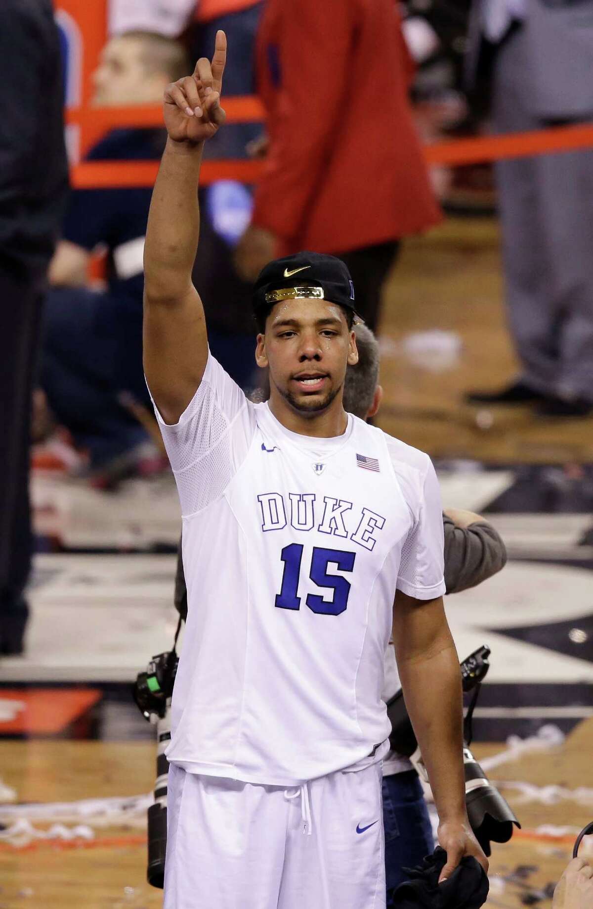 Duke's Jahlil Okafor celebrates after his team's 68-63 victory over Wisconsin in the NCAA Final Four college basketball tournament championship game Monday, April 6, 2015, in Indianapolis. (AP Photo/Darron Cummings) ORG XMIT: FF279