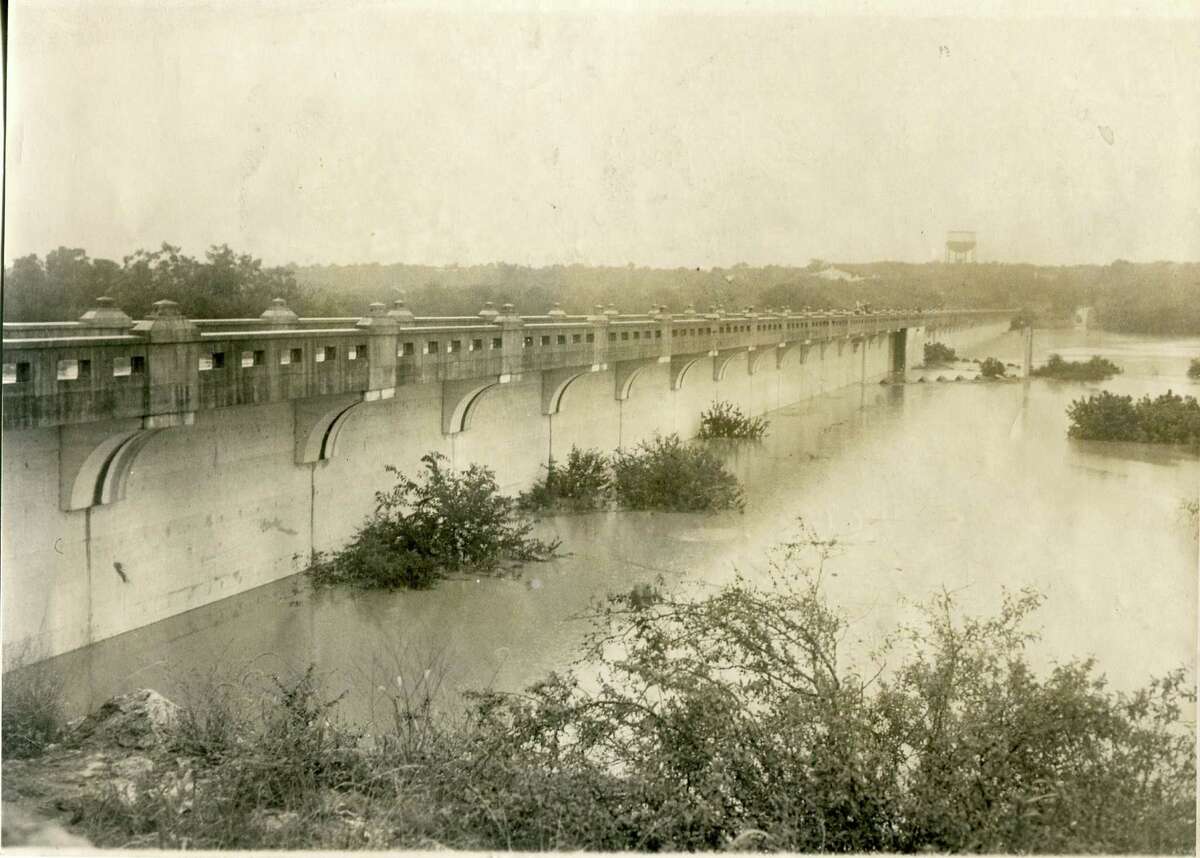 In this 1946 photograph of Olmos Dam, water had risen to 35 feet, 10 feet above what formerly had been called the danger line.