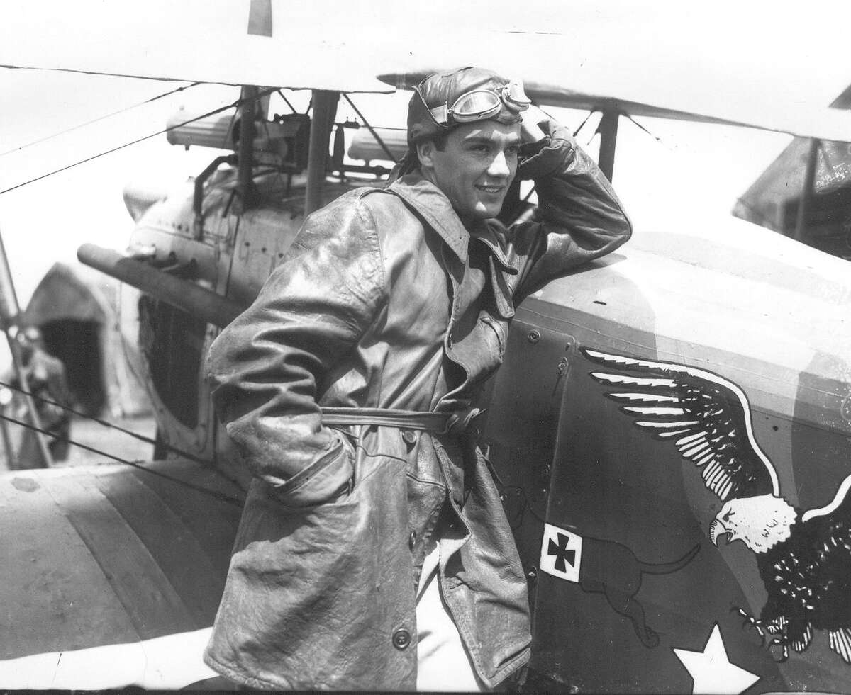 Charles "Buddy" Rogers poses beside a plane at Camp Stanley dressed as a pilot for his leading role in "Wings." This photo ran in the San Antonio Light, Sept. 19, 1926.