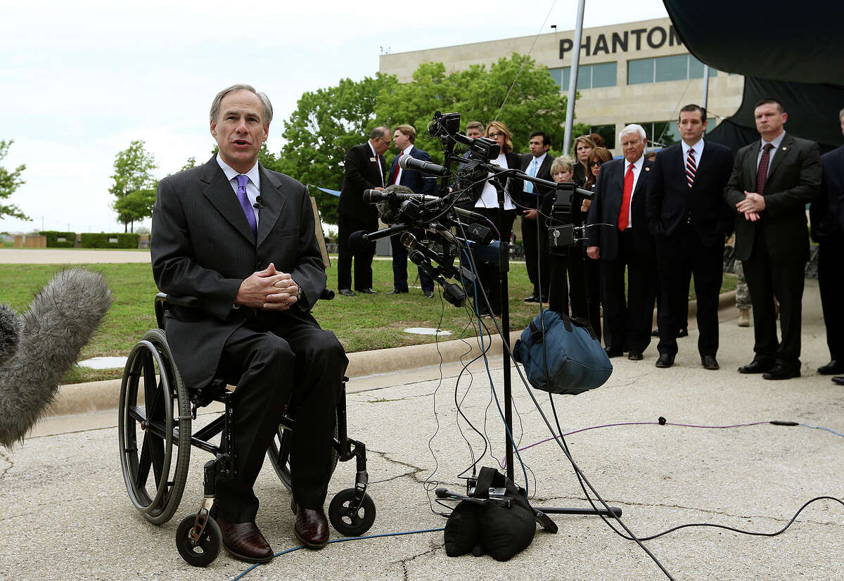 Texas Gov. Greg Abbott, who was injured in an accident years ago, uses a wheel chair. Advo cates are demanding he support a pay raise for those who attend to the disabled.