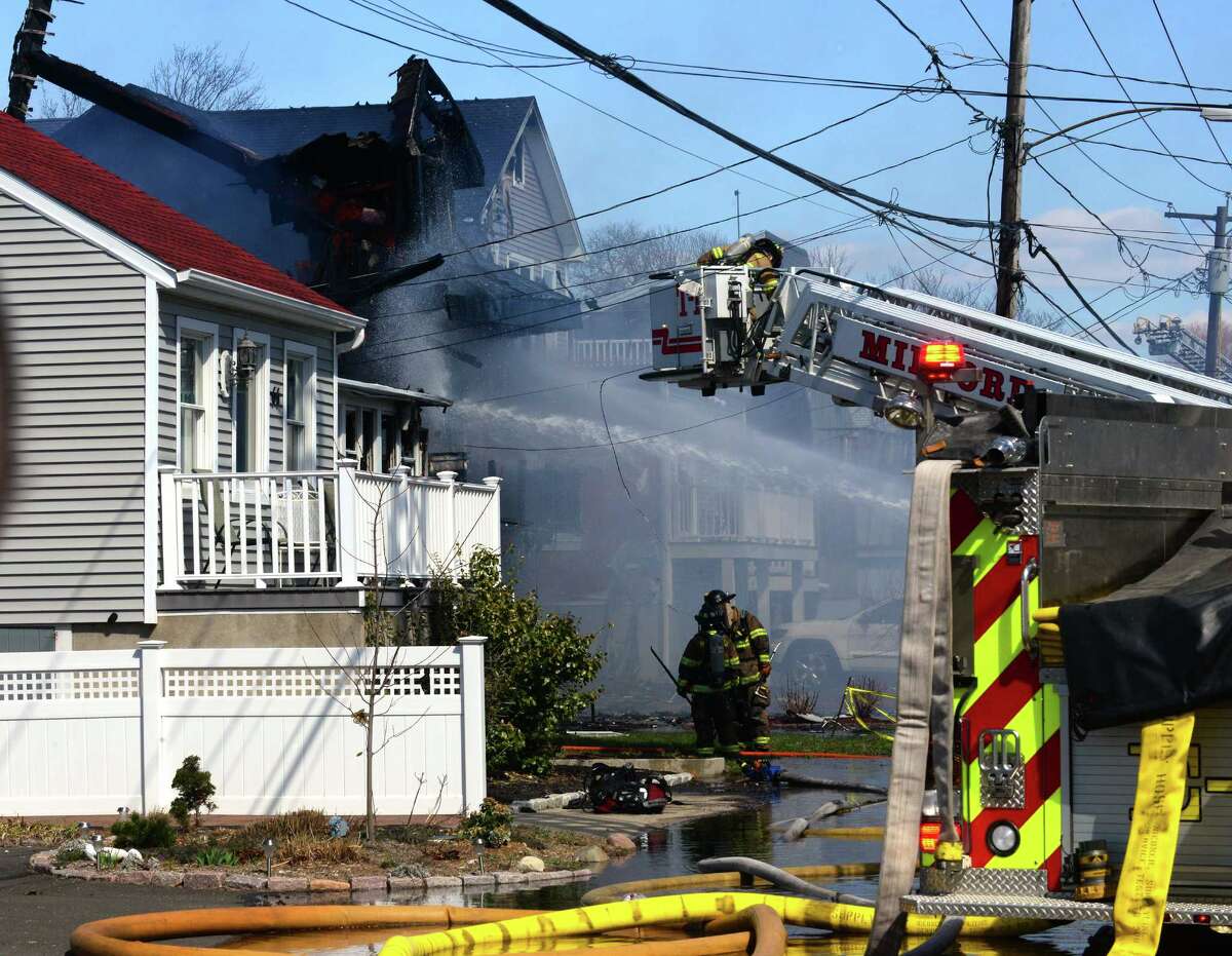 Fire destroys two homes in Milford, damages a third