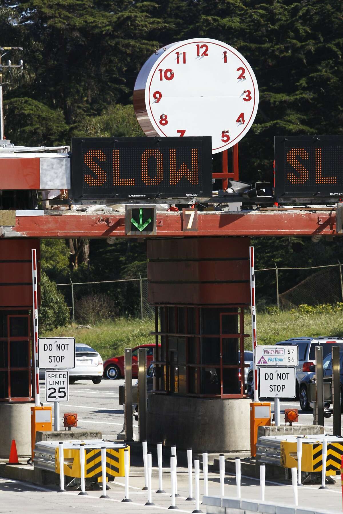 A clock is seen on the toll plaza at the south end of the Golden Gate Bridge on Sunday, April 12, 2015.
