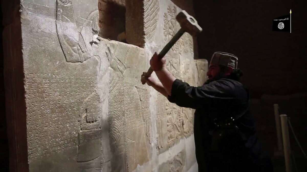 ﻿﻿A seven-minute video shows militants destroying reliefs depicting Assyrian kings and dieties at Nimrud, a site dating back to the 13th century B.C.