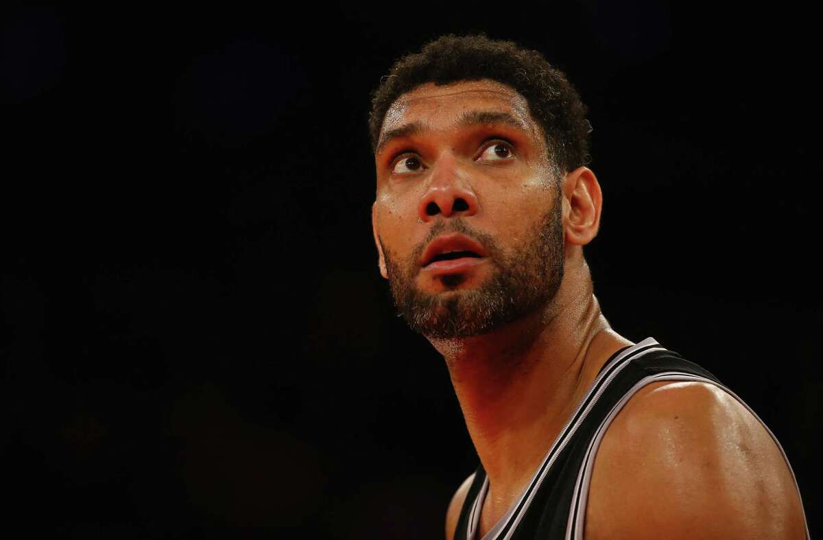 Tim Duncan #21 of the San Antonio Spurs looks on during the game against the New York Knicks during their game at Madison Square Garden on March 17, 2015 in New York City. NOTE TO USER: User expressly acknowledges and agrees that, by downloading and/or using this photograph, user is consenting to the terms and conditions of the Getty Images License Agreement. (Photo by Al Bello/Getty Images)