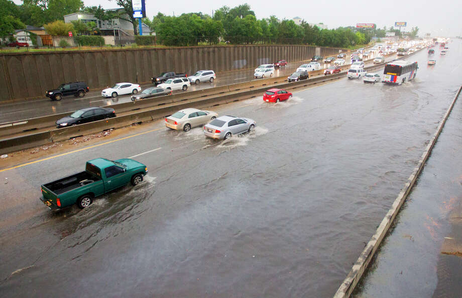 North Freeway near N. Main Street exitVehicles make their way through high water along the North Freeway near N. Main, Tuesday, May 13, 2014, in Houston. (Cody Duty / Houston Chronicle) Photo: Cody Duty, Houston Chronicle File / © 2014 Houston Chronicle