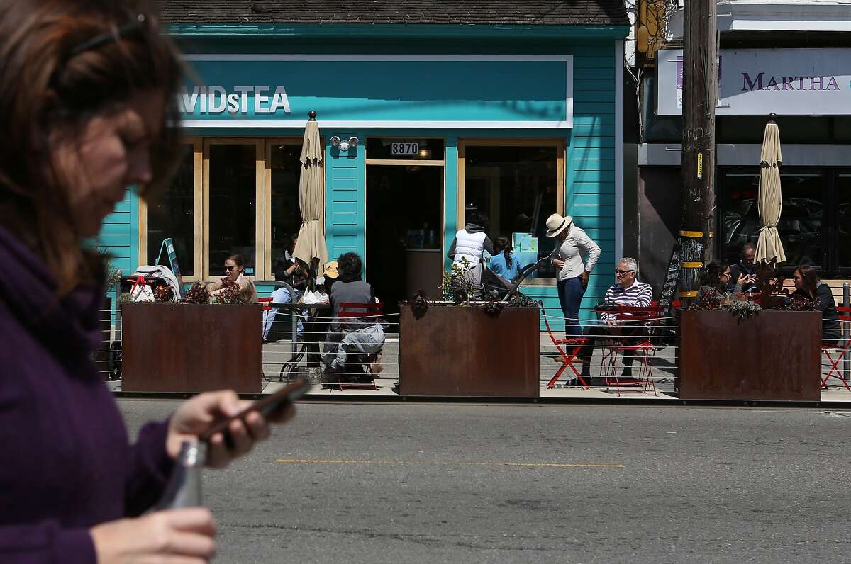 24th Street in Noe Valley is busy with neighborhood shoppers and pedestrians on Monday, April 13, 2015.