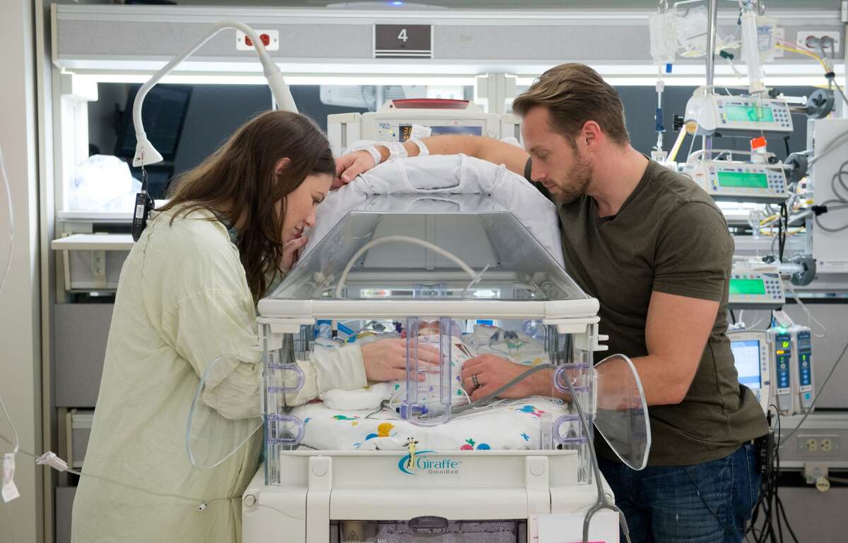 Danielle and Adam Busby with one of their five daughters born April 8, 2015, at The Woman's Hospital of Texas. They were the first all-girl quintuplets born in the world since 1969. PHOTOS: See more of Houston's amazing multiple births ... (Photo: Woman's Hospital of Texas)