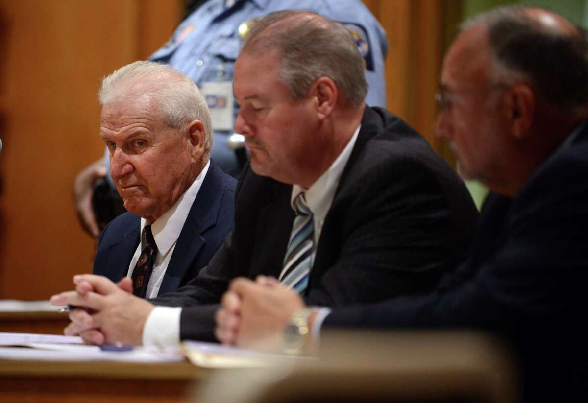Dominic Badaracco Sr., seated with his defense attorneys Edward Gavin and Richard Meehan, listens as Judge Robert Devlin hands down his sentence in Superior Court in Bridgeport, Conn. on Friday Sept. 13, 2013.