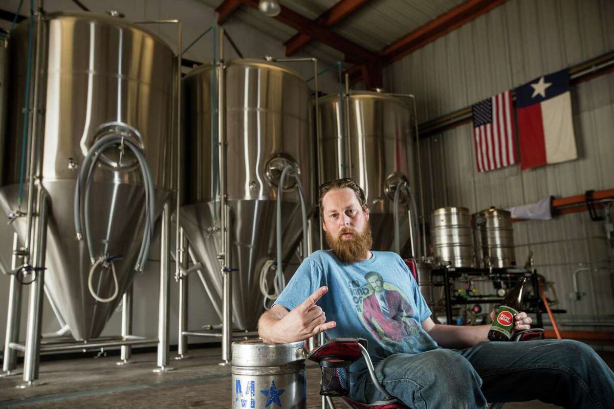 Brash Brewing Co. owner Ben Fullelove poses for a portrait on the brewery floor on Thursday, April 9, 2015, in Houston. ( Brett Coomer / Houston Chronicle )