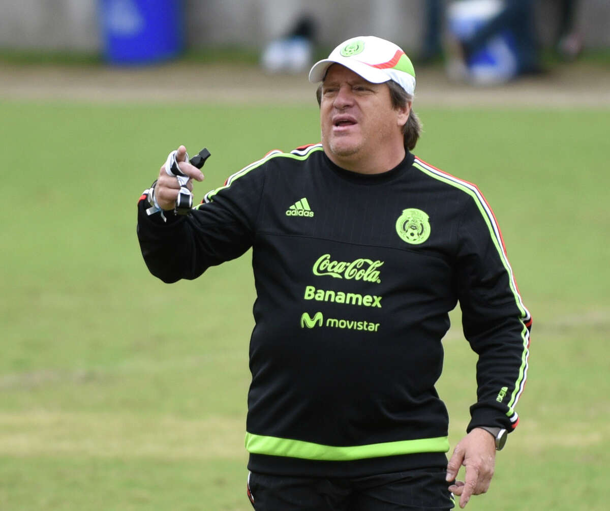 Mexico national team coach Miguel Herrera shouts instruction during a practice at Trinity University on Tuesday, April 14, 2015.
