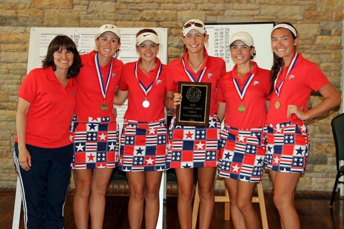 Clear Lake golf coach Karolyn Criado, from left, and players Jamie Treece, Kayla Brown, Kari Bush, Maggie Fulcher and Elise Tanzberger celebrate a 16th straight district championship and 34th overall.
