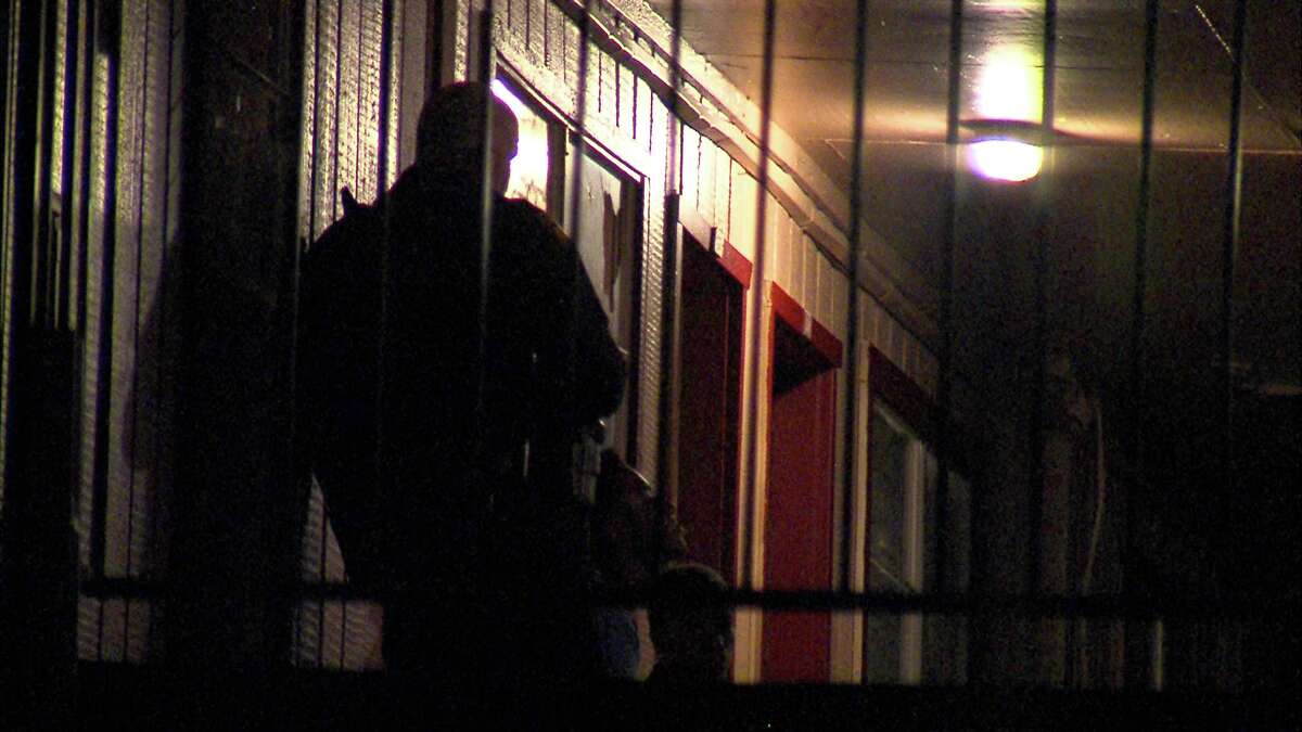 A woman was hospitalized Tuesday night after being shot at an apartment on the North Side.