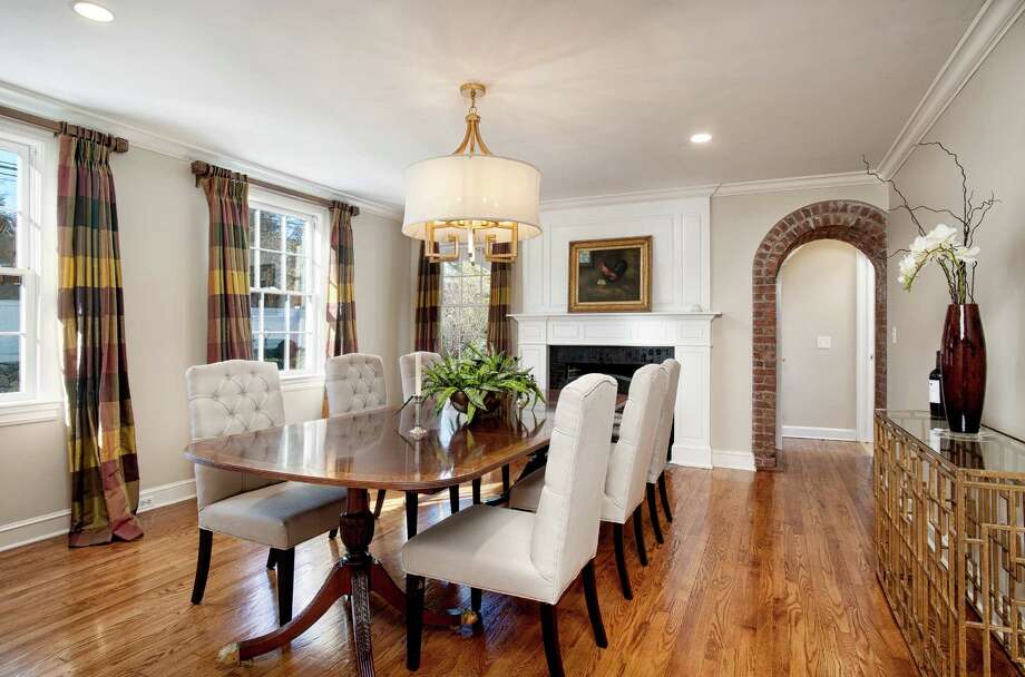 Something Old New At 589 Oenoke Ridge Road Canaan News An Oversized Dining Room With A Work Burning Fireplace And Exposed Brick Archway Photo