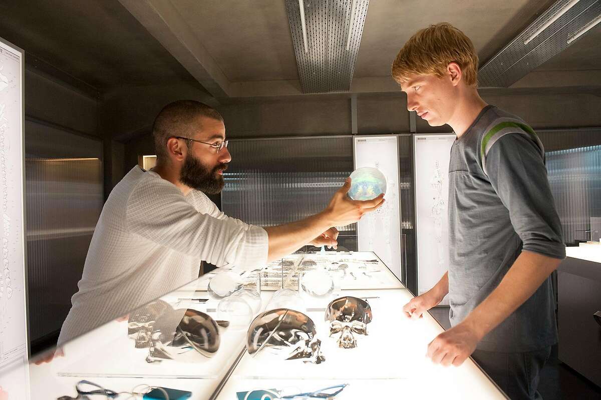 (L-r) Oscar Isaac and Domhnall Gleeson provide two of three terrific performances in “Ex Machina.” Illustrates FILM-EXMACHINA-ADV17 (category e), by Ann Hornaday © 2015, The Washington Post. Moved Wednesday, April 15, 2015. (MUST CREDIT: A24.)