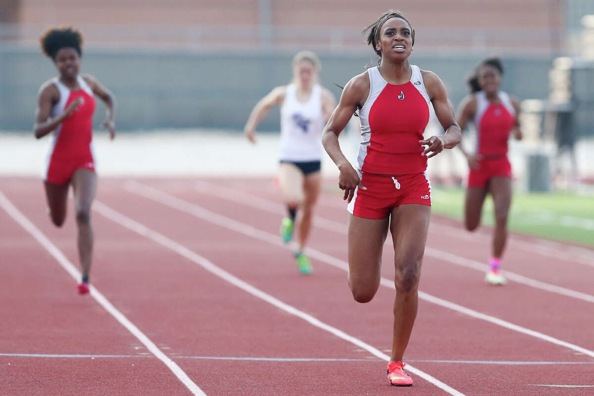 Judson’s Kiana Horton approaches the finish line of the 400-meter dash during the Thunderbird Relays at Rutledge Stadium on April 9, 2015. Horton won the event with a time of 54.30 seconds. Horton also won the 100-meter dash and ran a leg on the Rockets’ first place 400-meter relay.