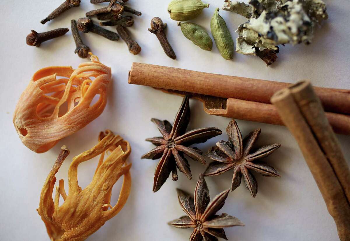 Java tree (clockwise from bottom left), cloves, green cardamon, kalpasi, cinnamon and star anise are some of the spices used at Aachi Aappakadai in Sunnyvale.