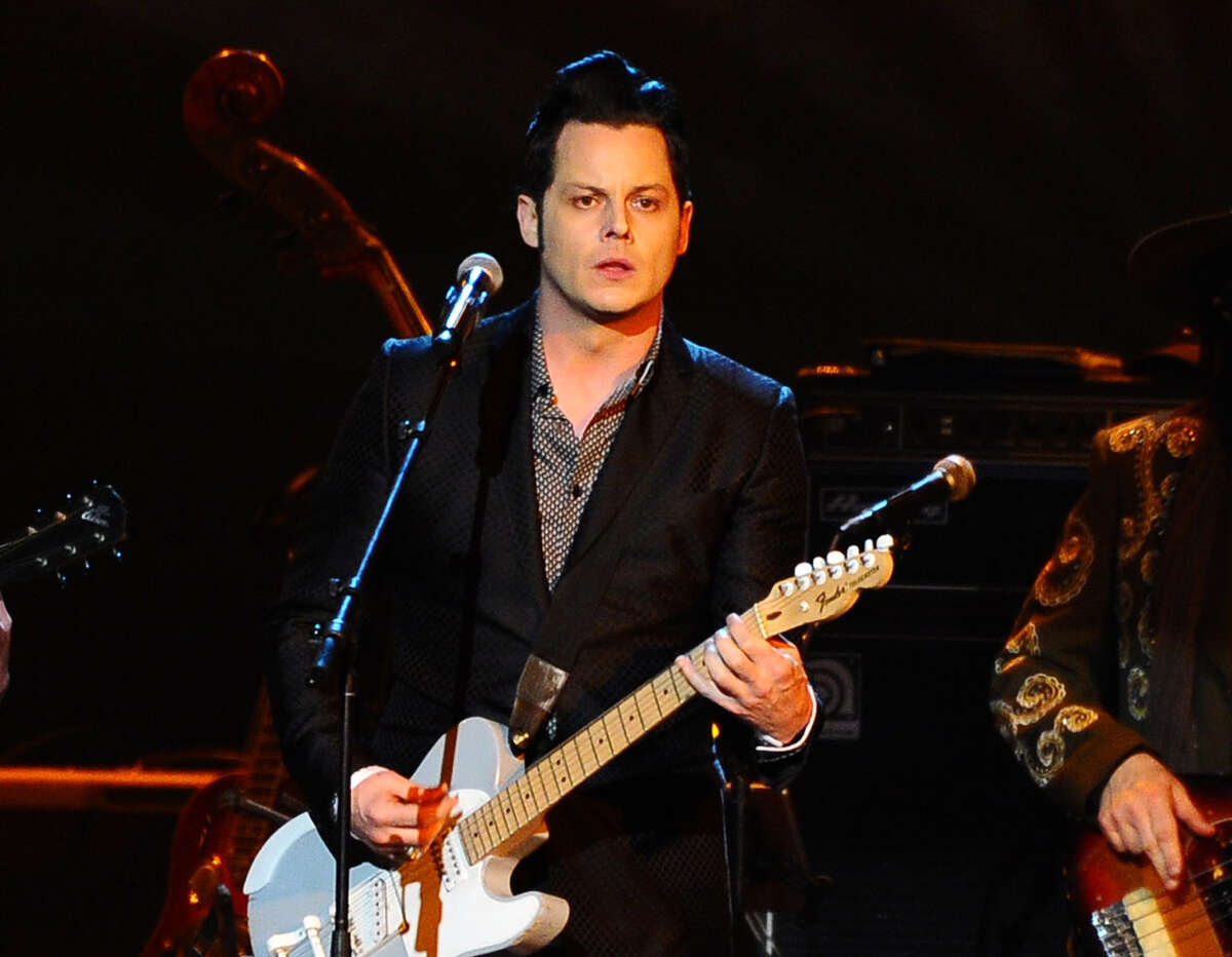 FILE - In this Feb. 6, 2015 file photo, Jack White performs at the 2015 MusiCares Person of the Year show at the Los Angeles Convention Center in Los Angeles. White says he?’s about to take a long break from performing live but not before holding five mysterious, acoustic-only shows in the five states where he hasn?’t yet played. The performances will be announced at 8 a.m., local time, on the day of the show. Tickets will cost just $3, be limited to one per person and available only at the venue door starting at noon on the day of the show, according to White?’s website. (Photo by Vince Bucci/Invision/AP, File) ORG XMIT: NYET310