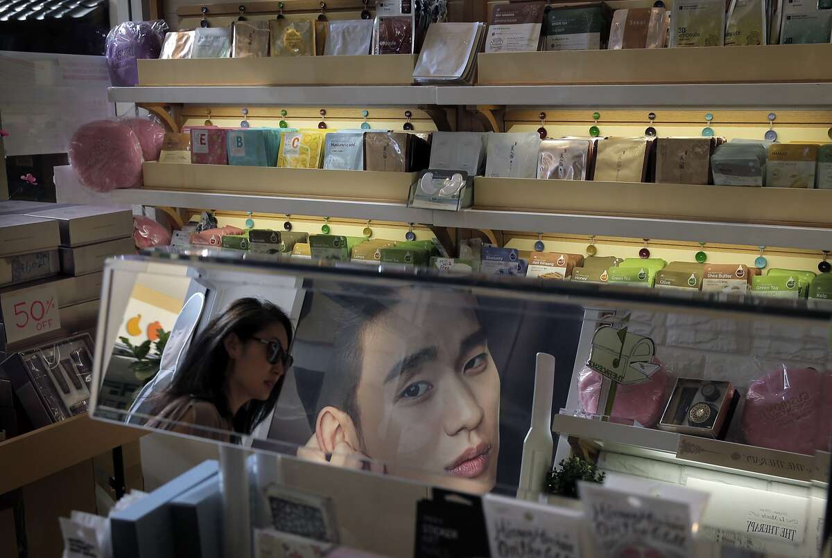 A customer enters the Face Shop in San Francisco, Calif., which specializes in Korean beauty items on Wednesday, April 15, 2015.