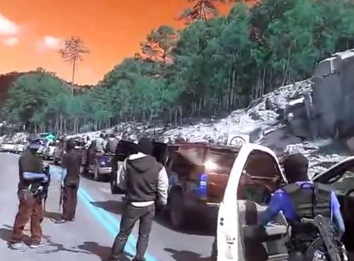 A video posted to YouTube on April 8, 2015, by online tabloid La Polaka shows several masked men with assault rifles sitting in and standing around pickup trucks stopped on a mountain road in Southwestern Chihuahua. The Chihuahua state attorney general's office told the El Paso Times that the footage was filmed before a September battle between two rival groups near the town of Tonachí, where Mexican authorities found 11 men dead and four torched vehicles.