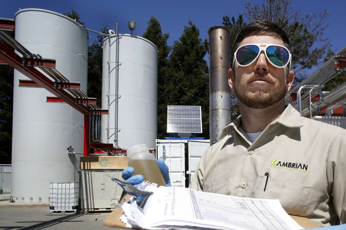 Cambrian systems operator Andrew Goodman tests waste water samples from the new system that will clean up the waste water from the Lagunitas Brewing Company brewing process and generate electricity in Petaluma, California, on Tuesday, April 14, 2015.
