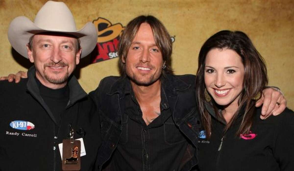KJ 97Randy Carroll, left, pictured with Keith Urban and co-host Jamie Martin, is a San Antonio staple when it comes to country music on the radio. He's be on air with KJ 97 for more than 30 years. Tip your hat to that.