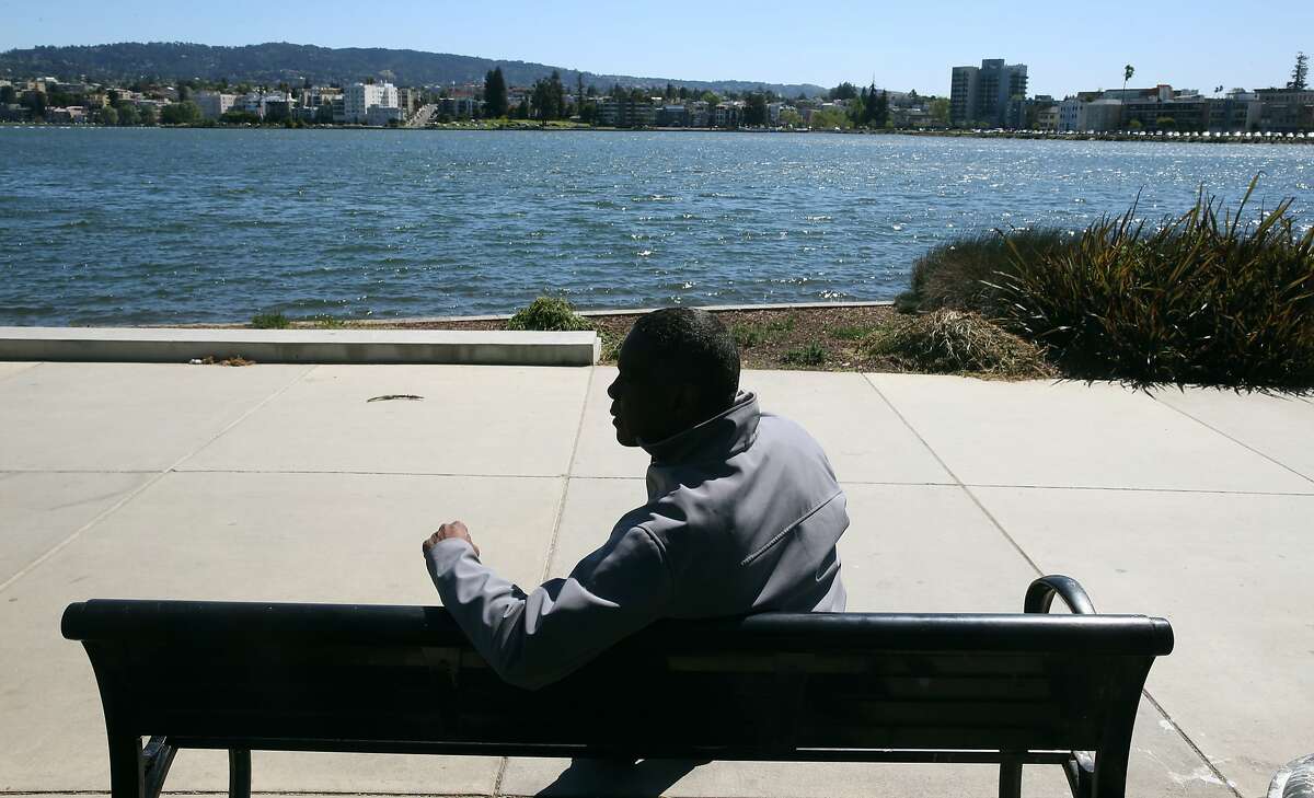 Property developer Michael Johnson is seen at Lake Merritt in Oakland, Calif. on Thursday, April 16, 2015. Johnson is hoping to build a 24-story residence tower at Lake Merritt Boulevard and East 12th Street but is facing opposition.