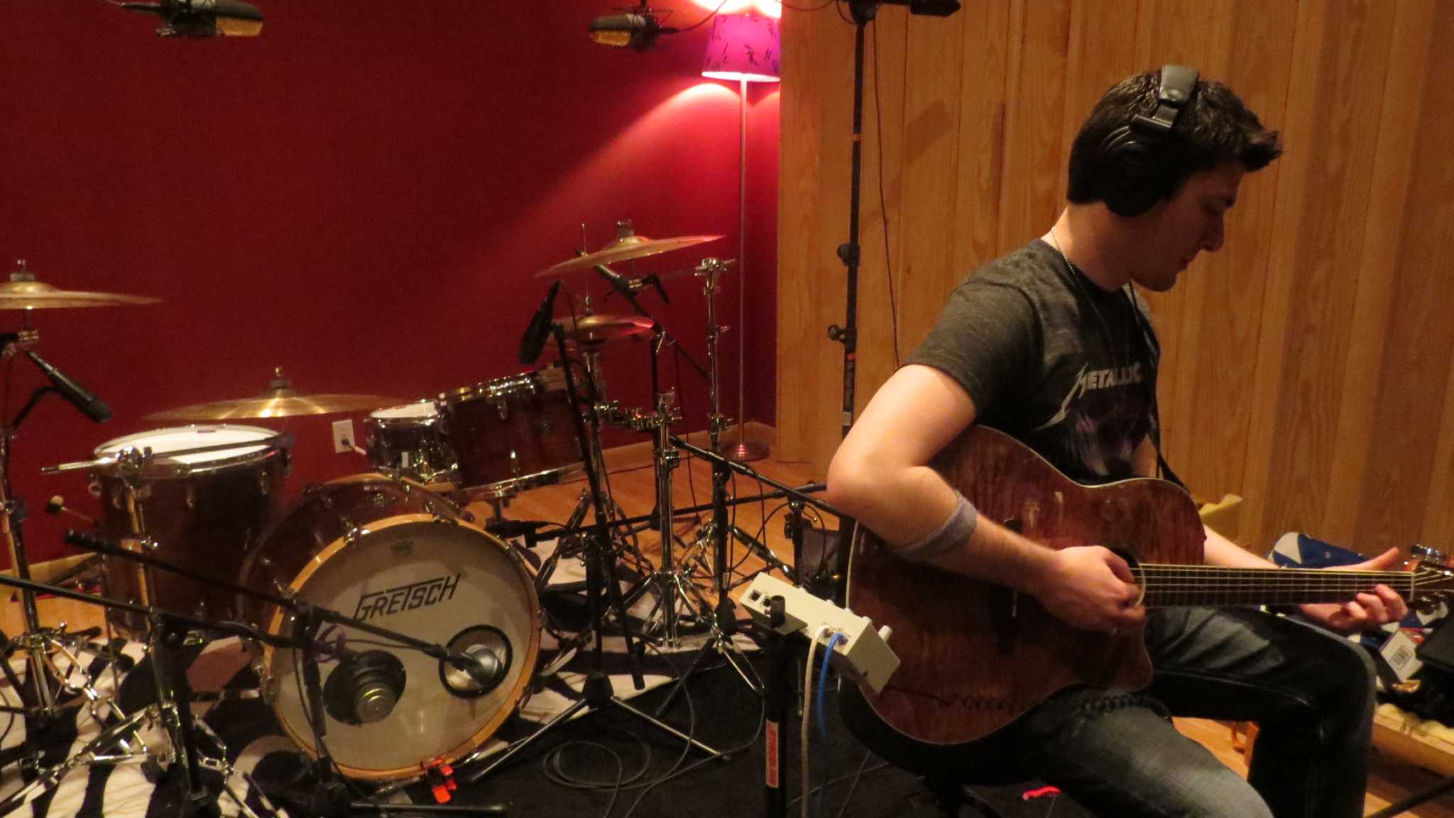 Queensbury guitarist gains experience in music industry