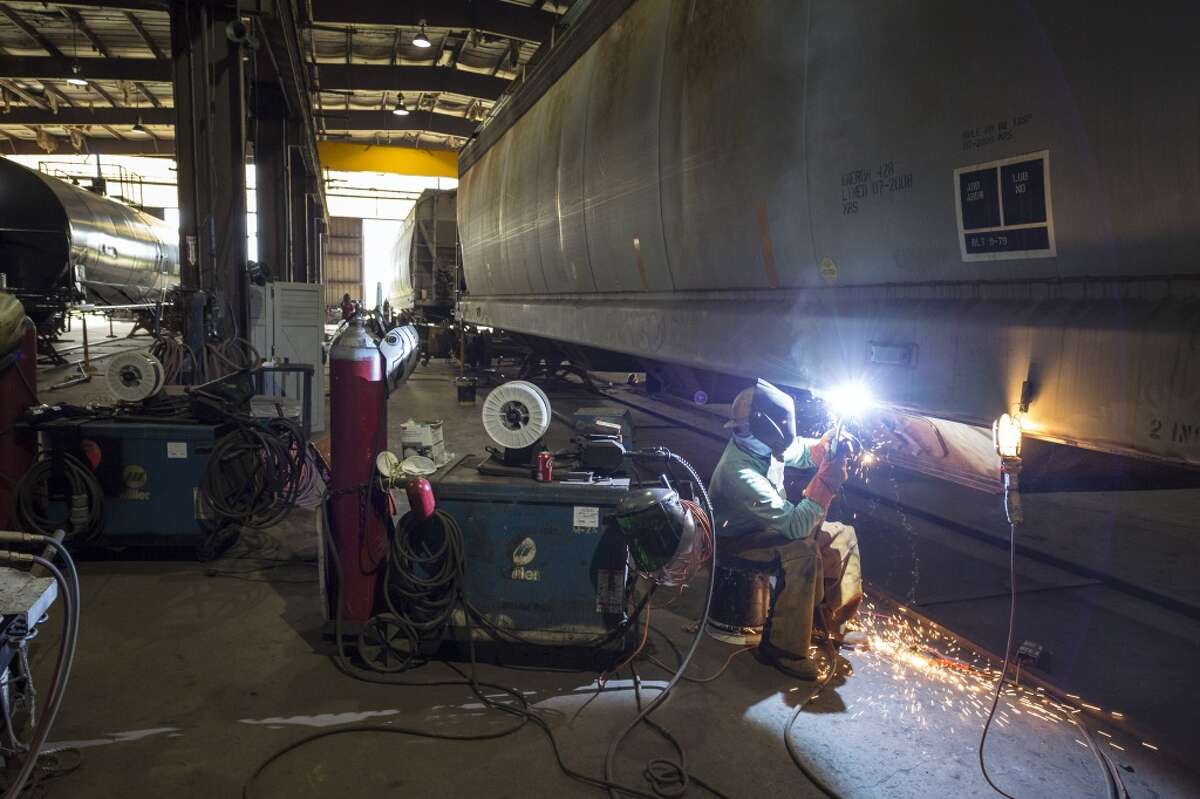 NTSB Chairman Christopher Hart tours the GBW Railcar Services factory at 17000 Premium Drive, Hockley, Texas, today. GBX workers retrofit standard DOT-111 tank cars and other cars to higher standards. Thursday April 16, 2015 (Craig H. Hartley/For the Chronicle)