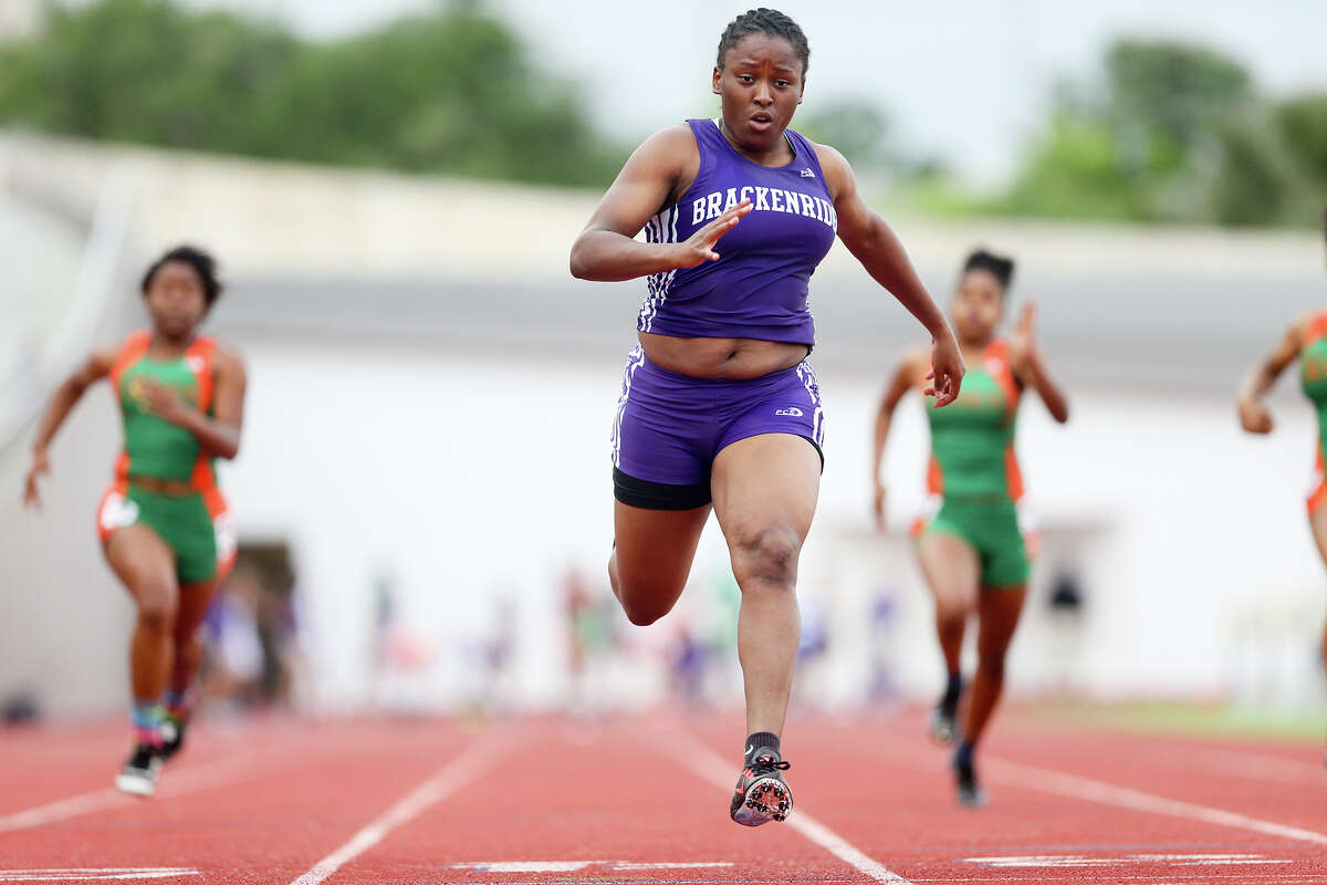 Brackenridge's Tevis Thomas crosses the finish line of the 100-meter dash during the finals of the running events in the District 28-5A track and field meet at Alamo Stadium on Thursday, April 16, 2015. Thomas won the event with a time of 12.13 seconds. MARVIN PFEIFFER/ mpfeiffer@express-news.net