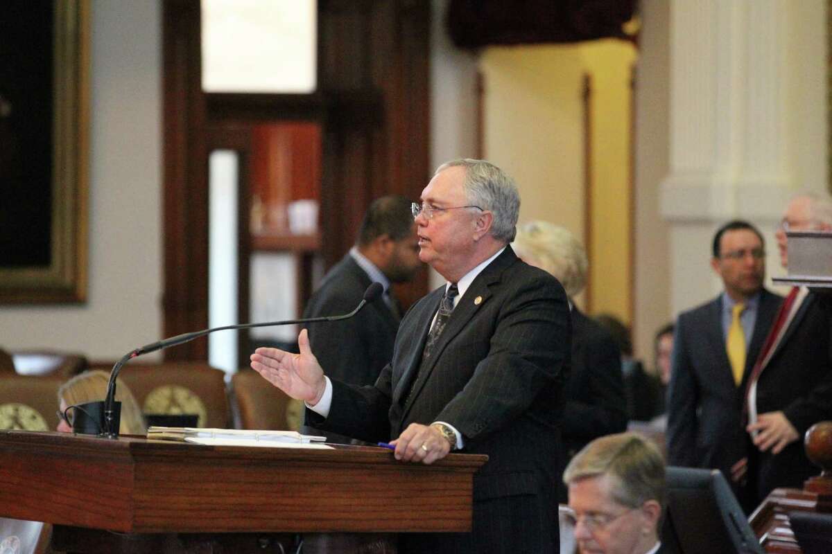 House Representative Drew Darby, HB 40 Fracking bill sponsor, works the house floor during session on Friday, April 17, 2015 at the state capitol building in Austin, Texas.
