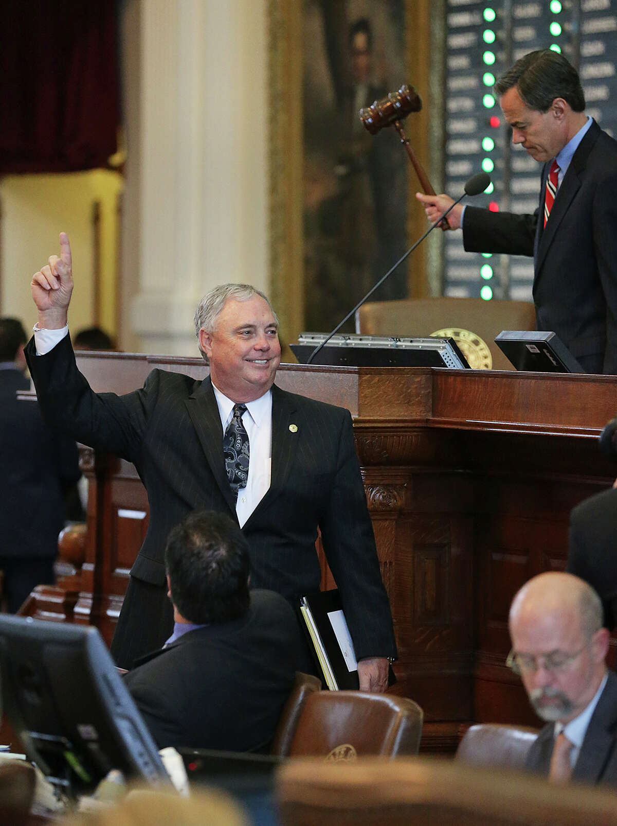 Drew Darby, R-San Angelo, sees an overwhelming vote for passage in the House of Representatives as HB40, the bill to regulate fracking, becomes law on April 17, 2015.