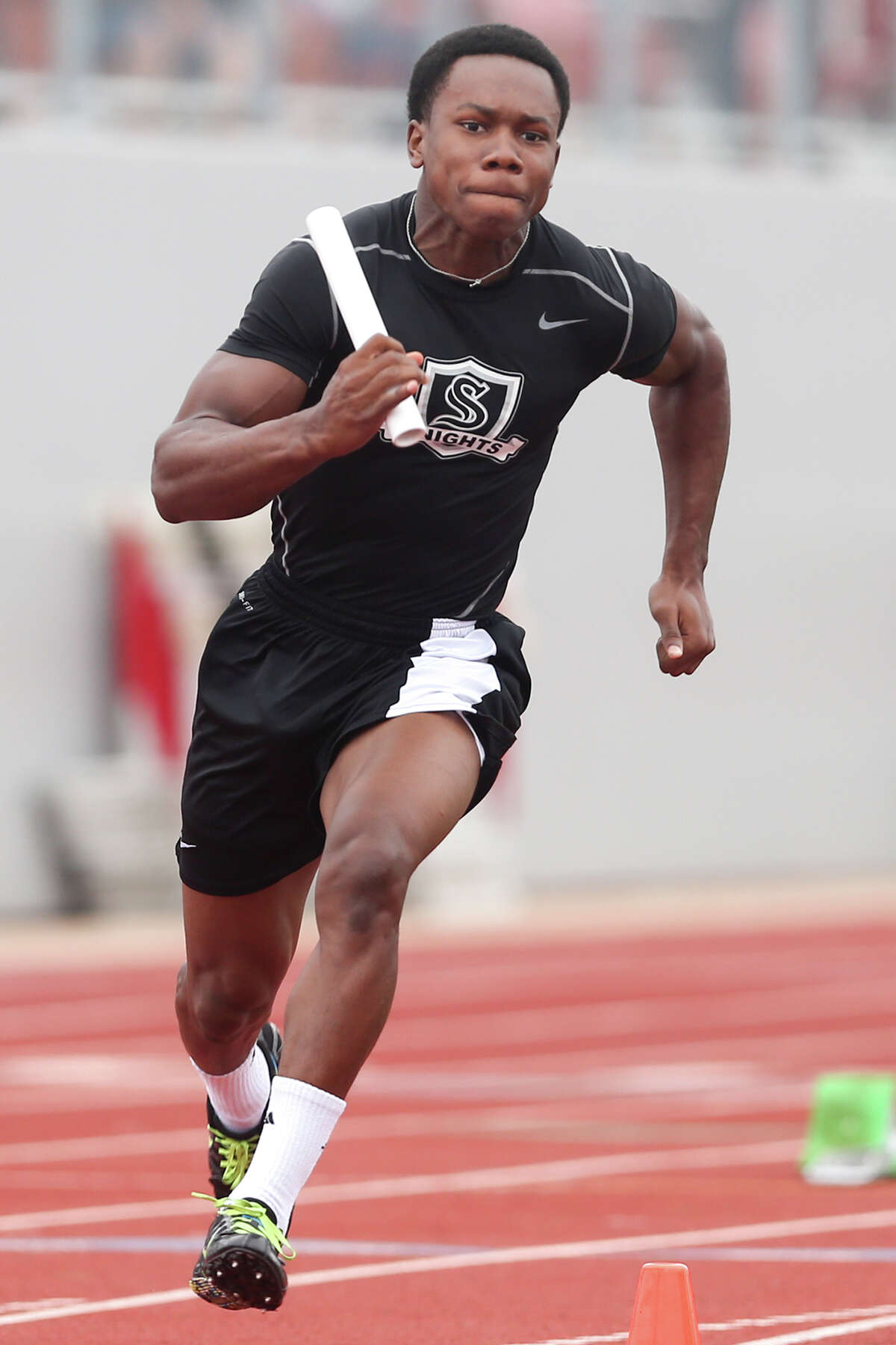 Steele's Jaylen Harris leaves the blocks on the first leg of the 400-meter relay during the finals of the running events in the District 25-6A track and field meet at Rutledge Stadium on Friday, April 17, 2015. Steele won the event with a time of 42.12. MARVIN PFEIFFER/ mpfeiffer@express-news.net