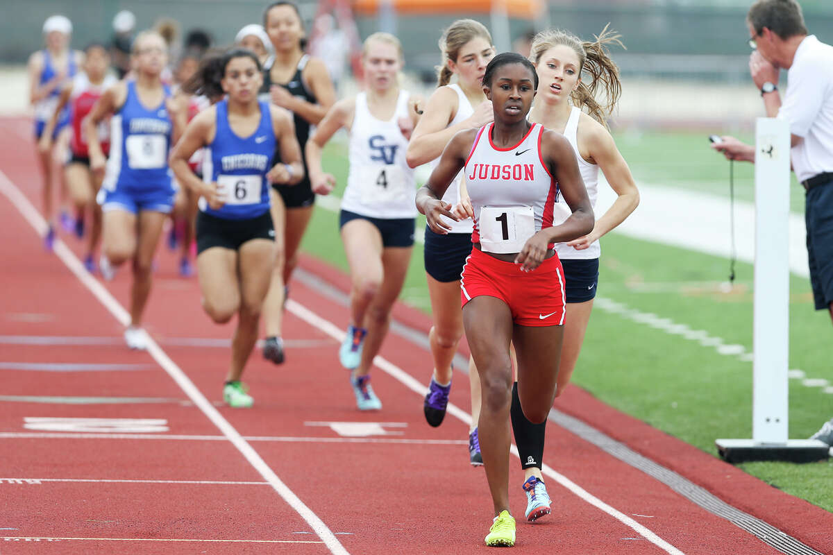 Judson's Dominique Allen leads the pack after the first lap of the 800-meter run during the finals of the running events in the District 25-6A track and field meet at Rutledge Stadium on Friday, April 17, 2015. Allen won the event with a time of 2 minutes, 13.26 seconds. MARVIN PFEIFFER/ mpfeiffer@express-news.net