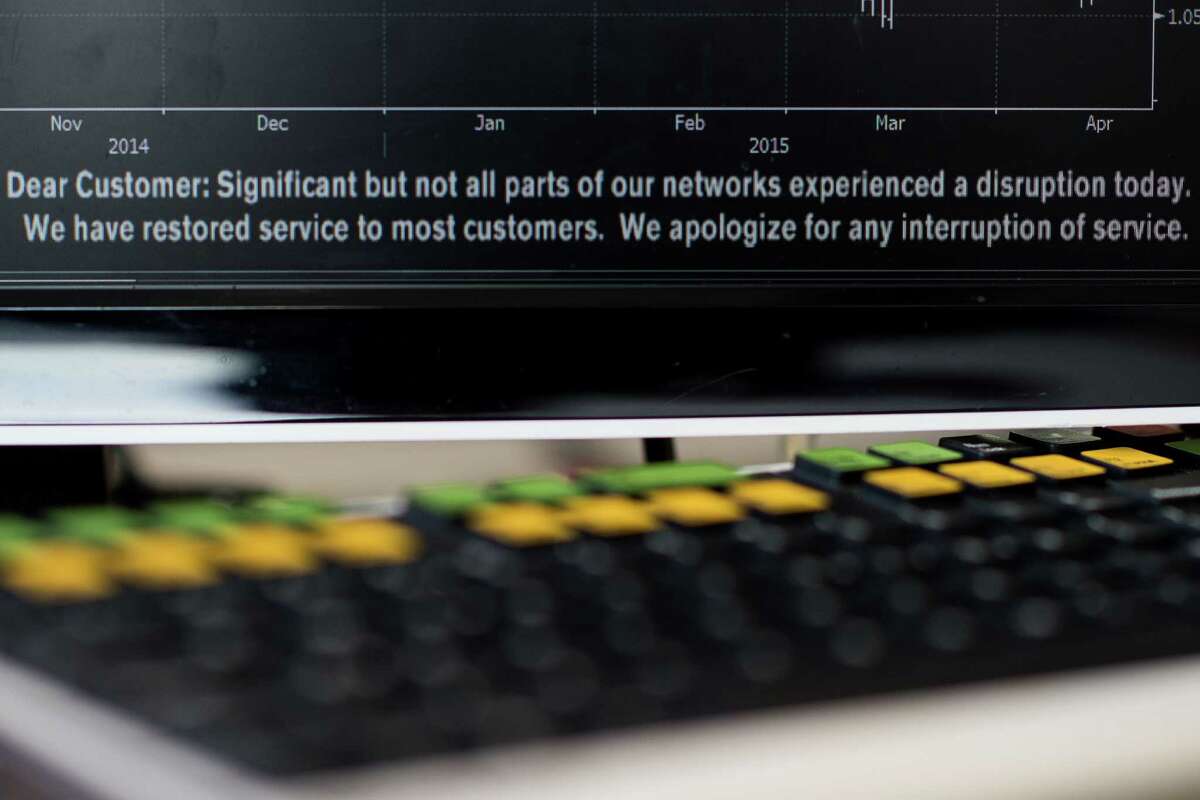 A Bloomberg terminal and keyboard is seen in central London on April 17, 2015. Bloomberg terminals used by subscribers to make trades using real-time developments in business and finance were struck by a "global network problem" for several hours today, the company said. After users in financial centres around the world flocked to Twitter to complain of the unexpected outage of terminals, Bloomberg technicians began repair operations that started bringing some blanked terminals back on line at around 0945 GMT. AFP PHOTO / LEON NEALLEON NEAL/AFP/Getty Images
