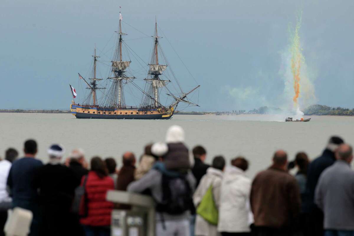 Onlookers gather to watch fireworks around the replica of the French navy’s L’Hermione, used to bring French troops and funds to American Revolutionaries in 1780, sailing near Fouras, France.
