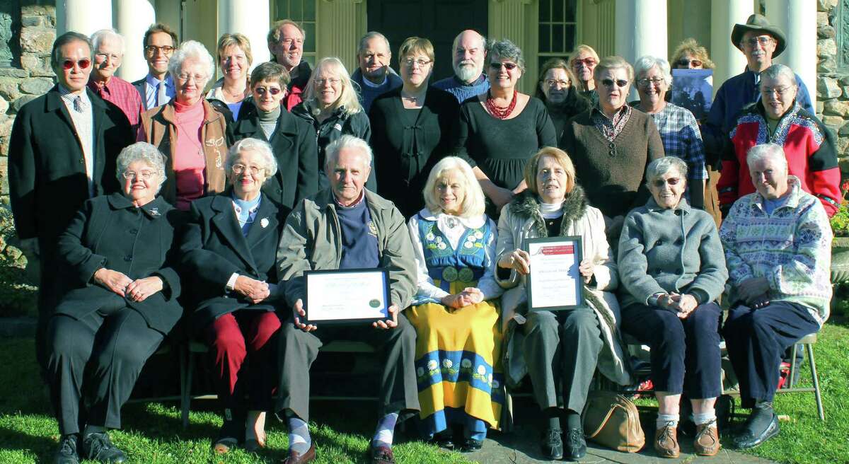 Among the Gunn Memorial Museum staff and volunteers who collaborated on the award-winning exhibit and program series âÄúComing to America: WashingtonâÄôs Swedish Immigrants.âÄù were, from left to right, front row, Dolly (Peterson) Whitney, Ann (Peterson) Dahl, Richard Anderson, Carol Skog,Doreen (Quist) Boesel, Audrey (Norman) Wright and Maryanne Lundberg; middle row, Chris Zaima, Charlotte Johnson, Diane Locke, Anne Quackenbos, Jennifer (Johnson) Whittlesey, Robin McHan (Swanberg family), Betty (Anderson) Hinckley and Janice (Sjonost) Burnham; and, back row, Willie Smith, Stephen Bartkus, Colleen Judson (Heline family), Richard Kleinberg, Keith Templeton, Craig Nelson, Sandy Booth, Constance Trolle (Hanning family), Sally Woodroofe, Sharon Rosenberg and Michael Bird. Courtesy of Gunn Memorial Museum