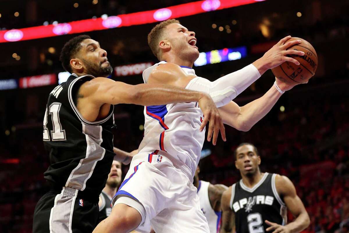 LOS ANGELES, CA - APRIL 19: Blake Griffin #32 of the Los Angeles Clippers goes up for a shot against Tim Undcan #21 of the San Antonio Spurs during Game One of the Western Conference quarterfinals of the 2015 NBA Playoffs at Staples Center on April 19, 2015 in Los Angeles, California. NOTE TO USER: User expressly acknowledges and agrees that, by downloading and or using this photograph, User is consenting to the terms and conditions of the Getty Images License Agreement.