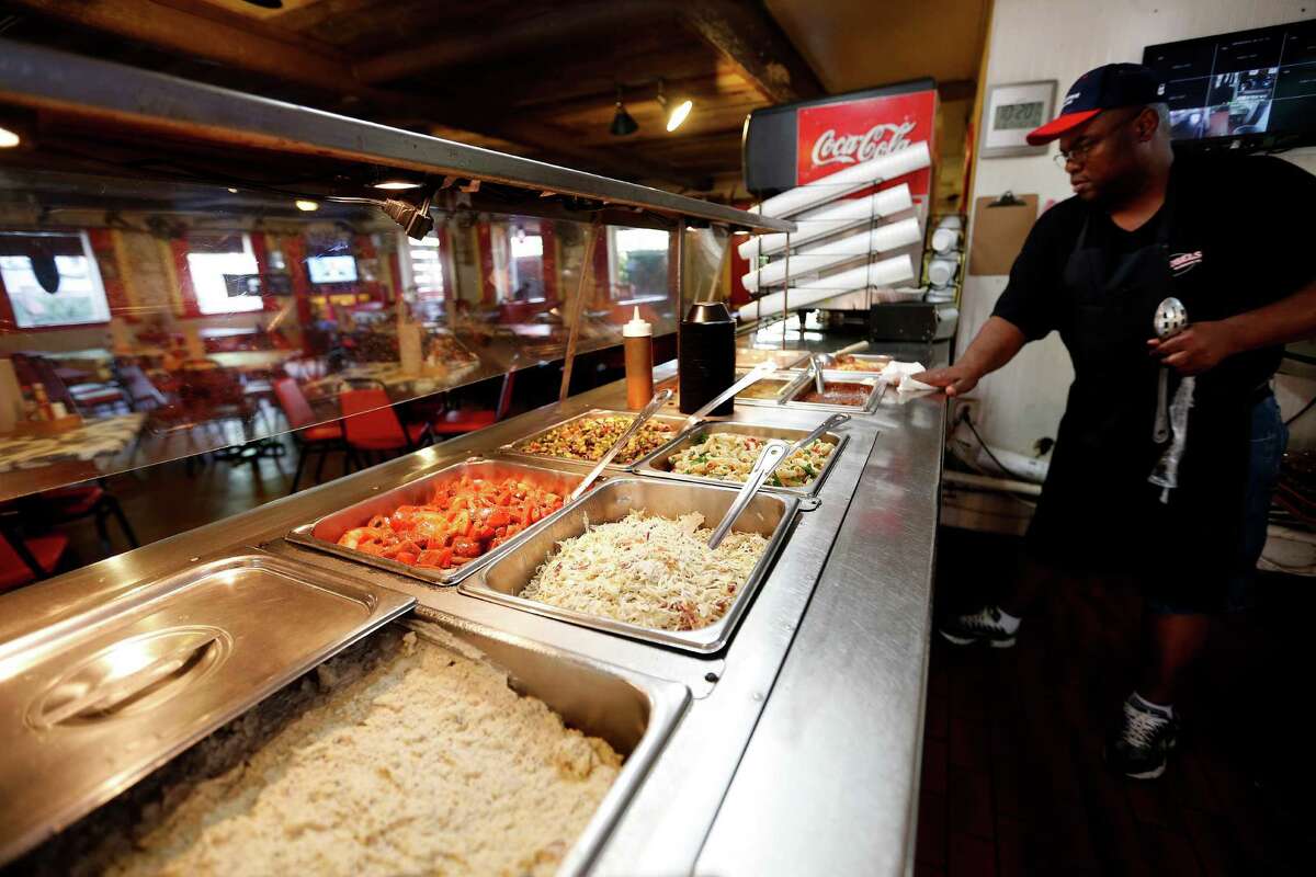 The counter filled with sides at Roegels Barbecue Co. on Voss, Thursday, April 16, 2015, in Houston. ( Karen Warren / Houston Chronicle )