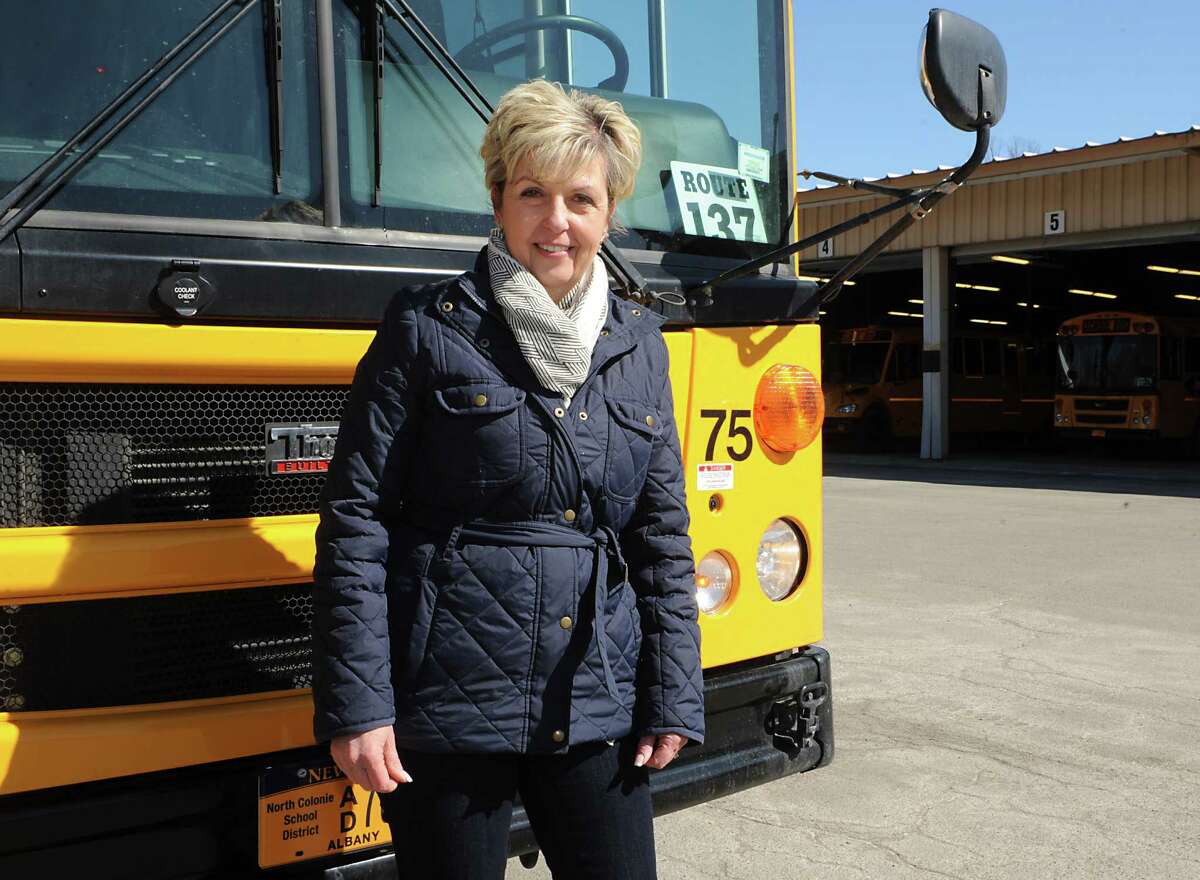 Bus driver Patty Mitchell stands in front of the school bus she drives on Monday, March 23, 2015 in Latham, N.Y. (Lori Van Buren / Times Union)