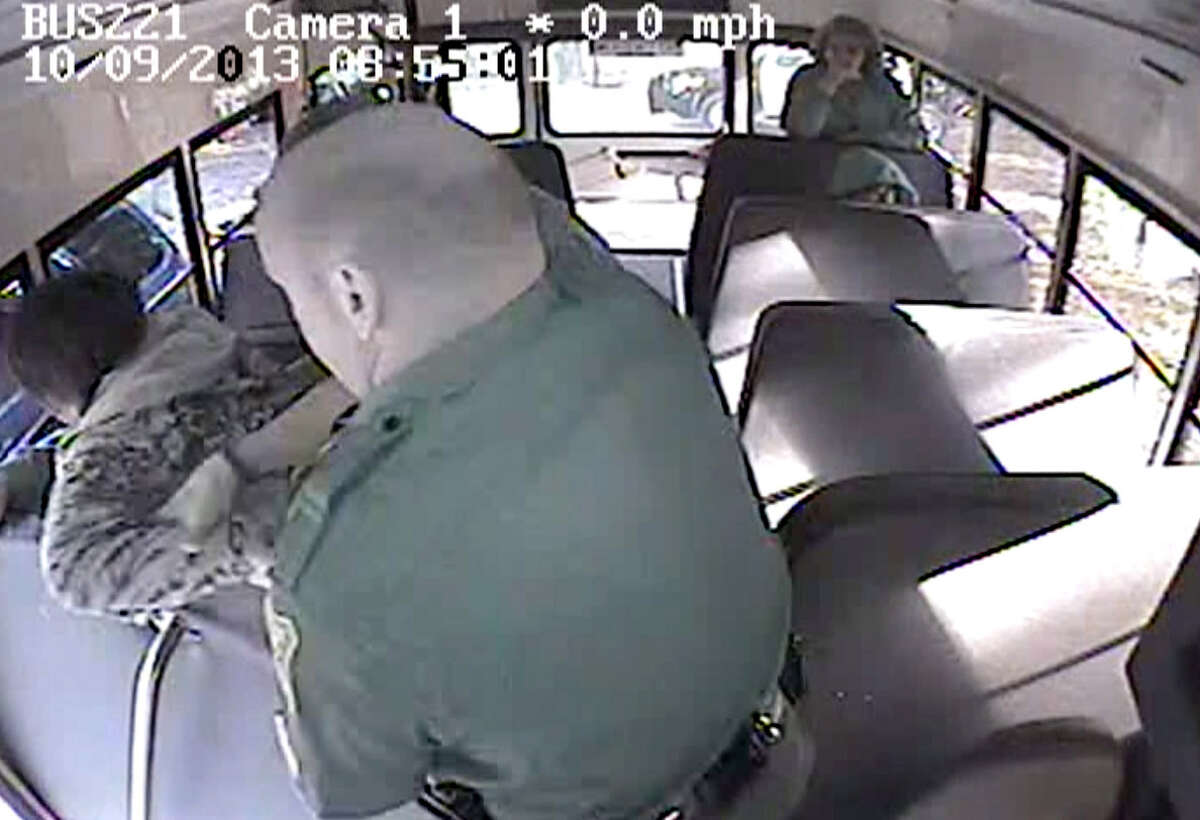 Screen grab from surveillance video which shows Rotterdam Police officers forcefully removing Jacob Gocheski, 16, from a Mohonasen Transportation school bus after Gocheski threatened the bus driver. The Gocheski's arm was broken during the brief skirmish. (Courtesy Rotterdam Police)