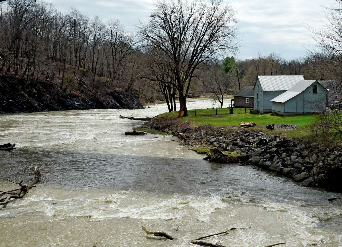 Albany landfill crews open Normans Kill after landslide