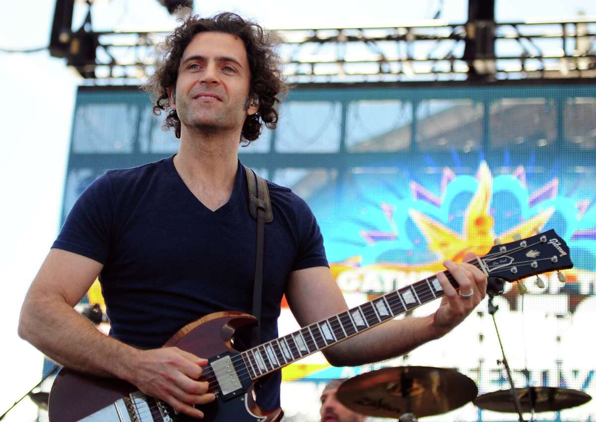 Guitarist Dweezil Zappa performs with Zappa Plays Zappa during the Gathering of the Vibes at Seaside Park in Bridgeport, Conn. Saturday, July 21, 2012.