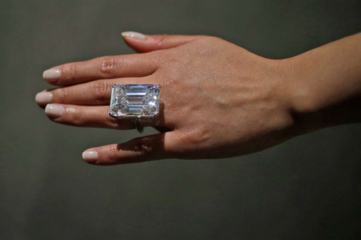 BIG GEM: This "perfect" 100-carat diamond in a classic emerald-cut has sold for just over $22 million at auction Tuesday. The diamond was mined in southern Africa ﻿and weighed over 200 carats before it was cut and polished. The record for any jewel is $46 million for a 24.78-carat emerald-cut pink diamond in 2010.