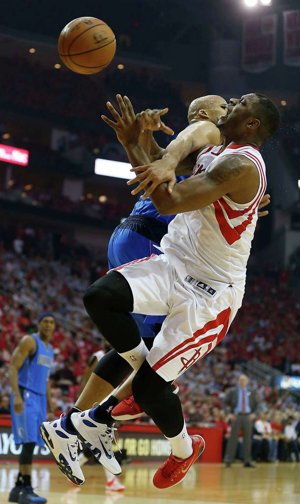 The Mavs' Richard Jefferson gets his money's worth on a hard foul against Terrence Jones.